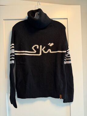Obermeyer Black Cowl Neck Sweater with White Script and Sleeve Stripes